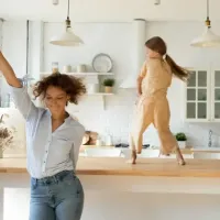 people dancing in kitchen