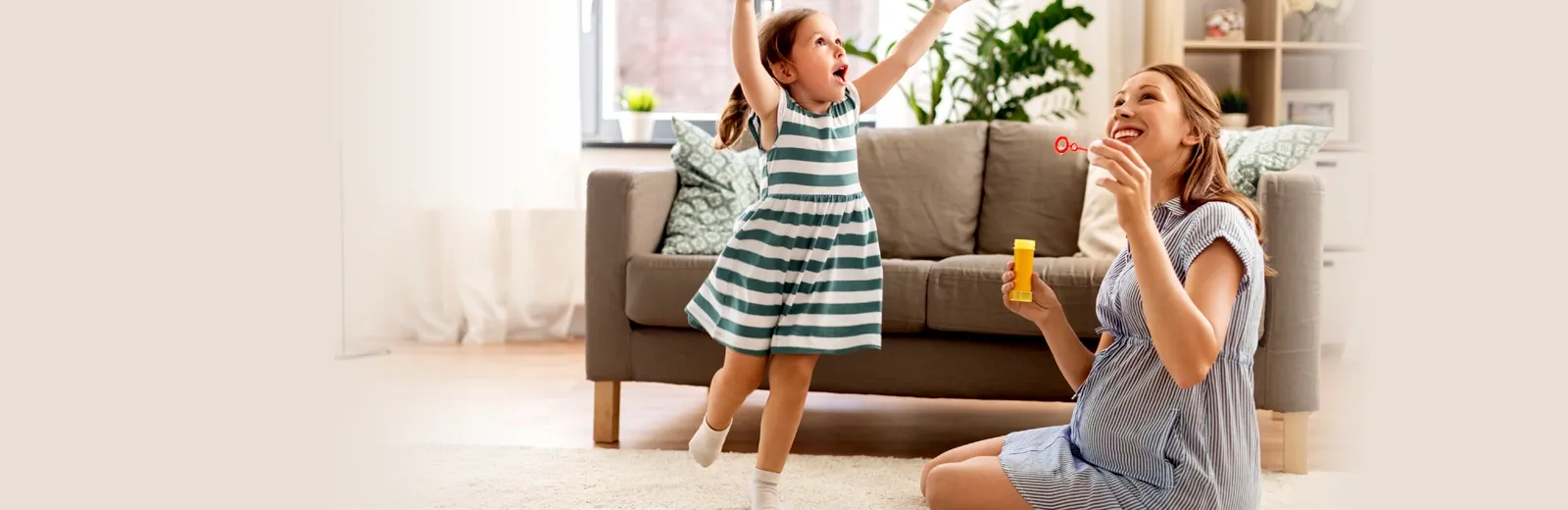 Mom and daughter playing in pest free home