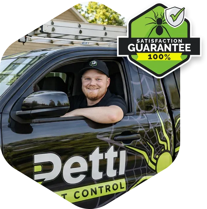 Petti Pest Technician in company truck